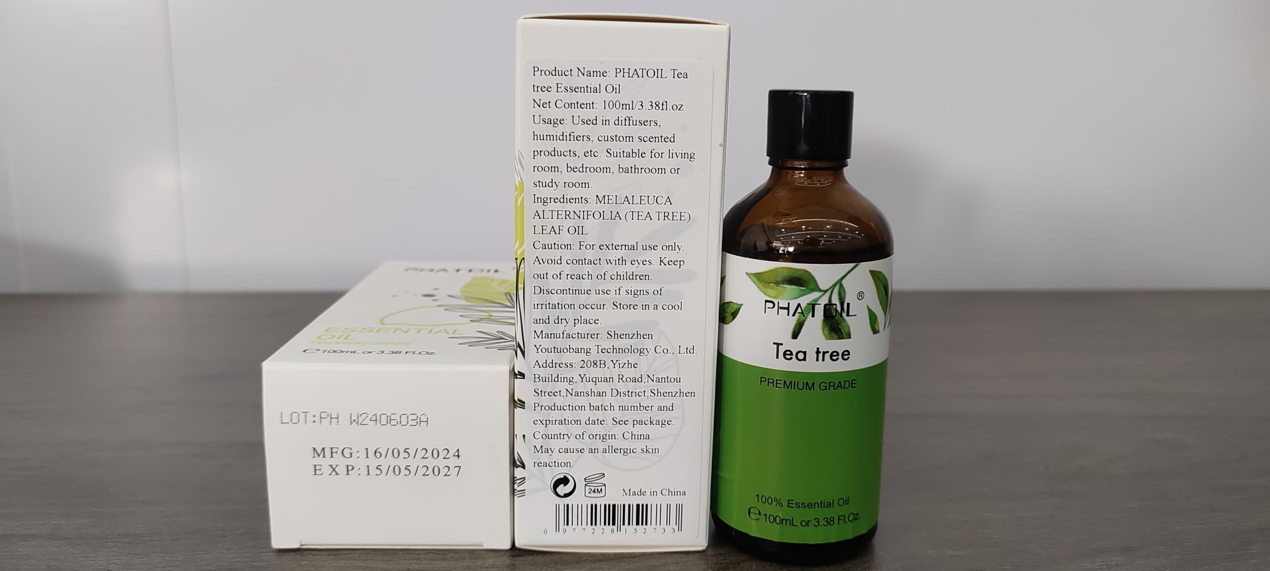 PHATOIL Tea Tree Oil label on bottle