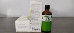 PHATOIL Tea Tree Oil label on bottle