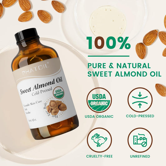 Close up of the golden cold pressed almond oil in a bottle