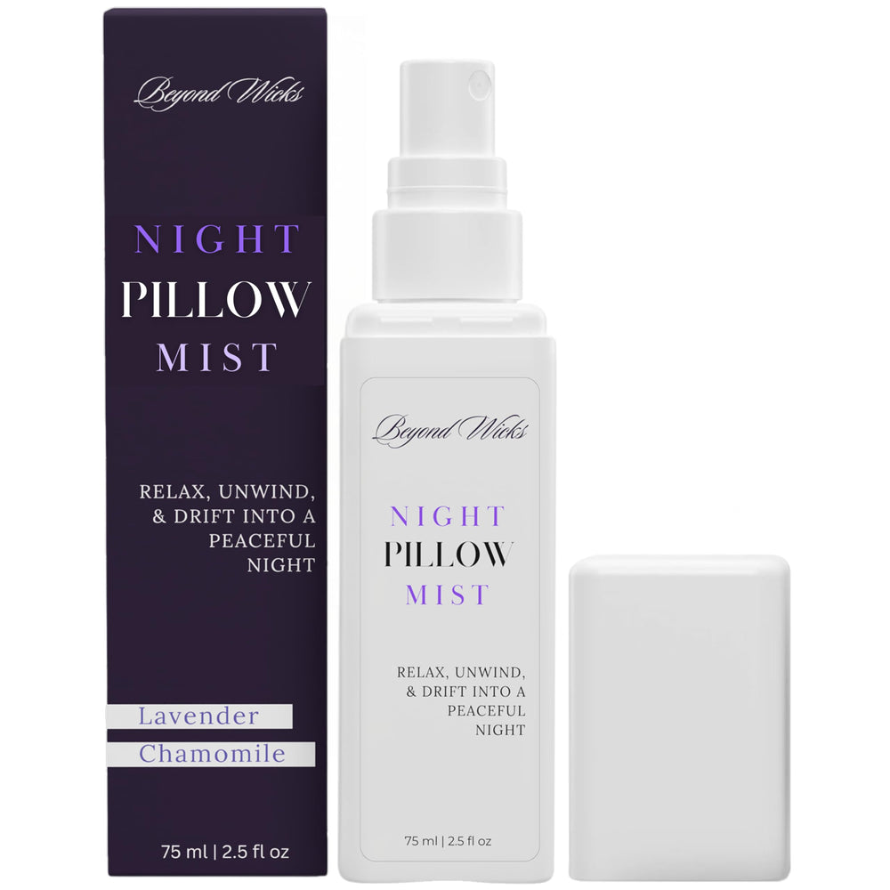 Soft-lit bedroom setup with pillow spray in focus