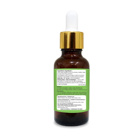 Close-up of Pine essential oil bottle with dropper