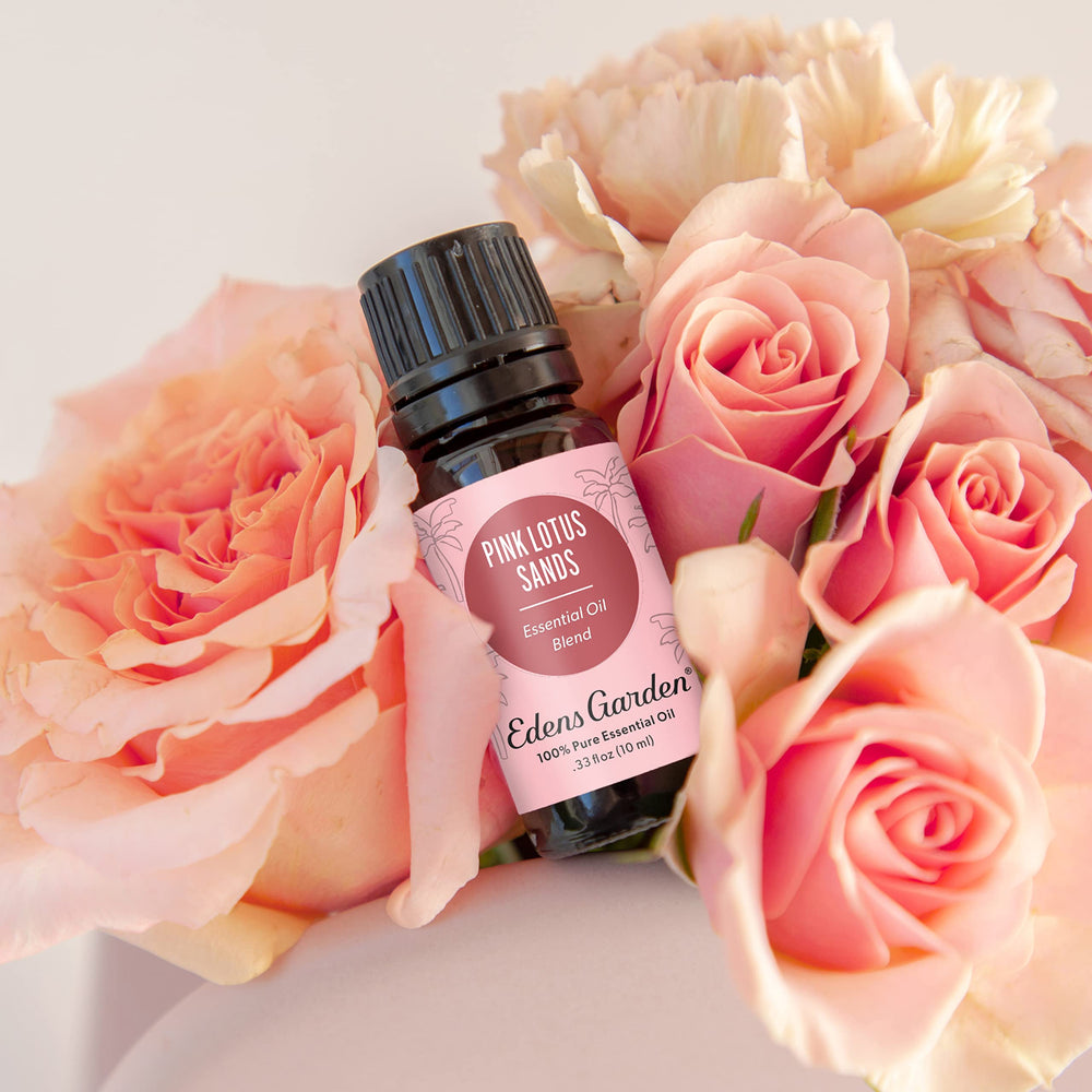 Close-up of Pink Lotus Sands essential oil bottle and label