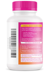 Pregnant woman holding belly with Pink Stork Labor Prep bottle