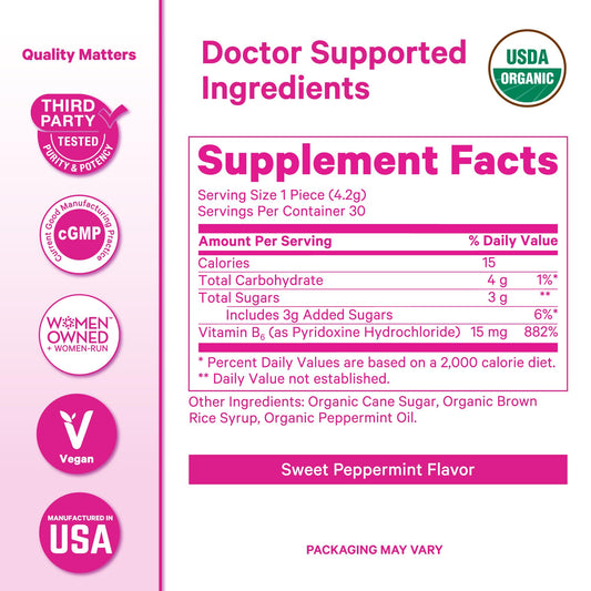 Pink Stork Peppermint Sweets lozenges close-up with organic mint aroma.