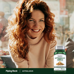 Piping Rock astragalus bottle on a tabletop with other supplements for routine use