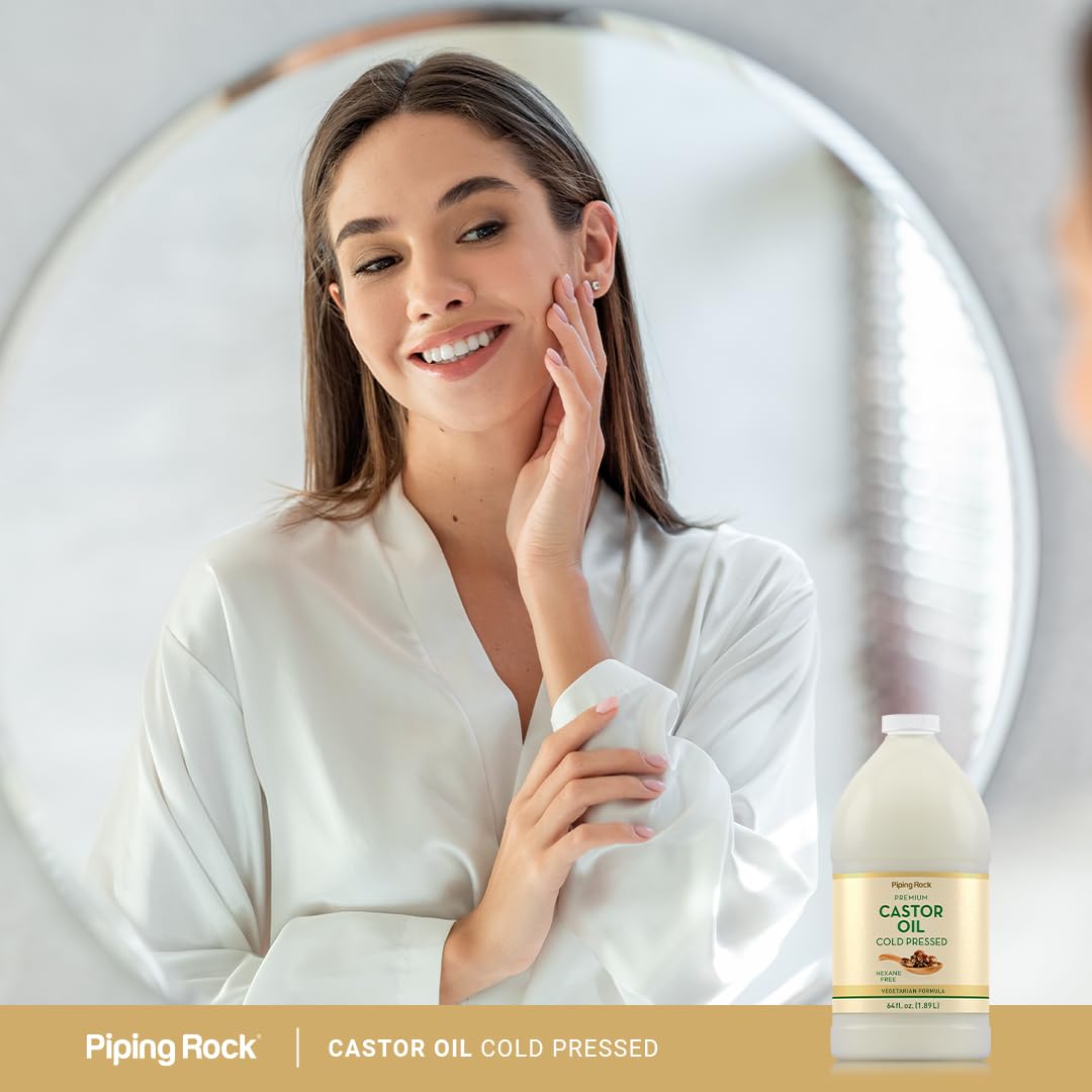 Piping Rock castor oil beside towels in bathroom illustrating daily use