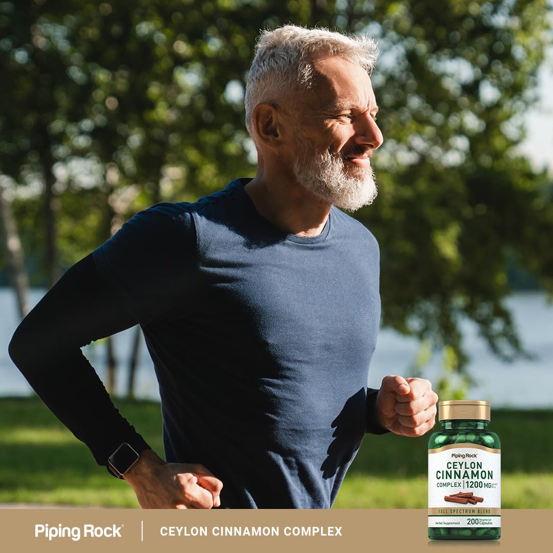 Piping Rock capsules beside cinnamon sticks linking supplement to natural spice