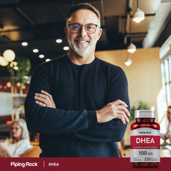 Piping Rock DHEA capsule held in hand demonstrating portable dosing and user convenience