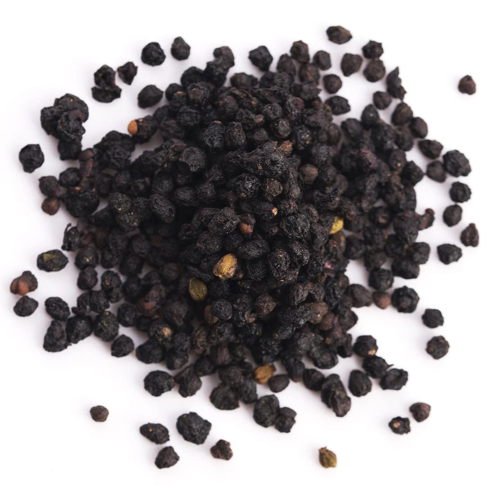 kitchen scene with Piping Rock elderberries and ingredients for syrup making