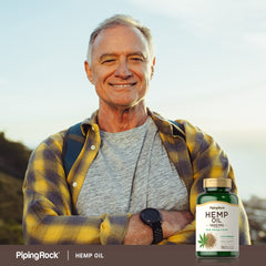 Piping Rock bottle on kitchen counter near a salad to suggest daily lifestyle convenience