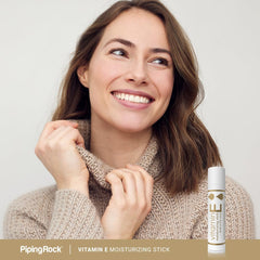 Piping Rock lip stick held in hand showing compact size and portable benefit