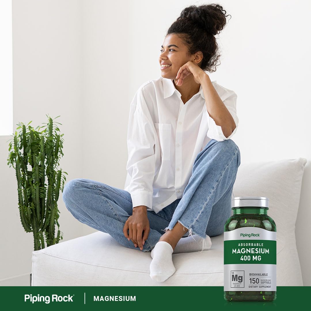 Piping Rock softgel in hand demonstrating easy-swallow size and convenience benefit