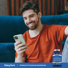 Piping Rock supplement on a kitchen counter next to water illustrating daily routine use