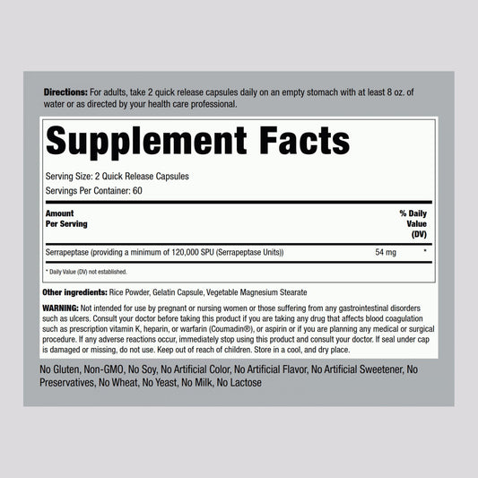 Close-up of Serrapeptase capsules inside bottle
