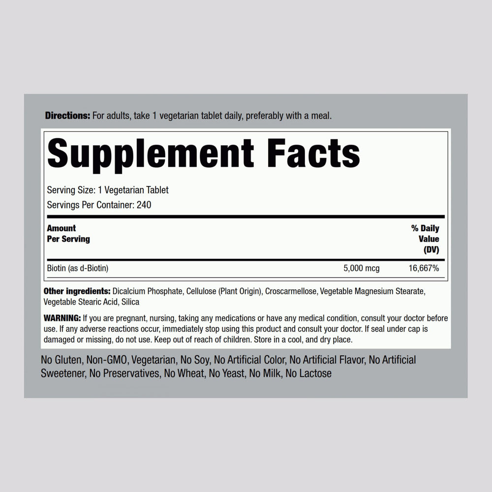 Piping Rock biotin tablet close-up highlighting smooth finish for comfortable swallowing