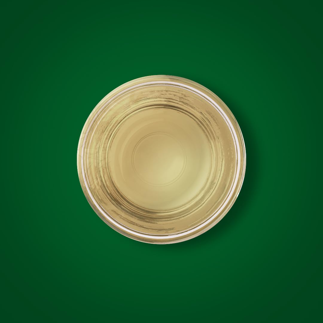 Close-up of amber bottle label and cap, emphasizing Piping Rock tested-quality branding