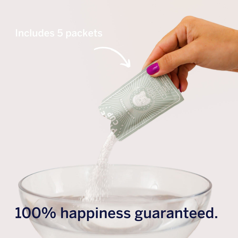 Results show brighter whites and colors after Pixie Cup stain remover treatment.