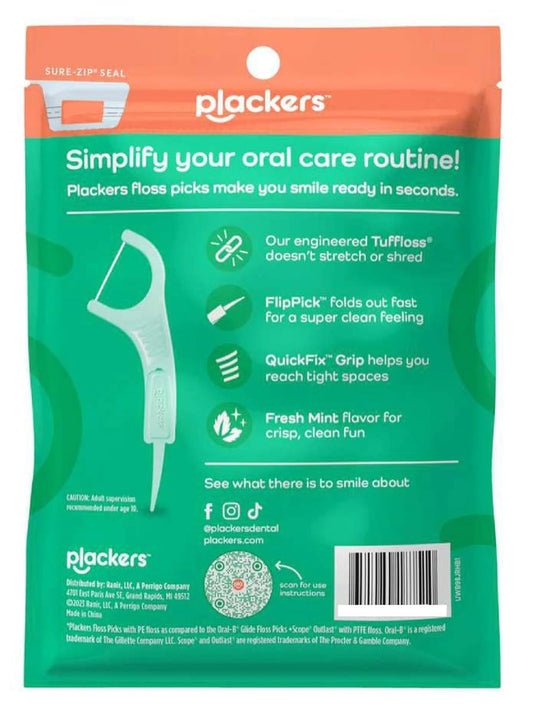 Close-up of Plackers Micro Mint Flossers sliding between teeth
