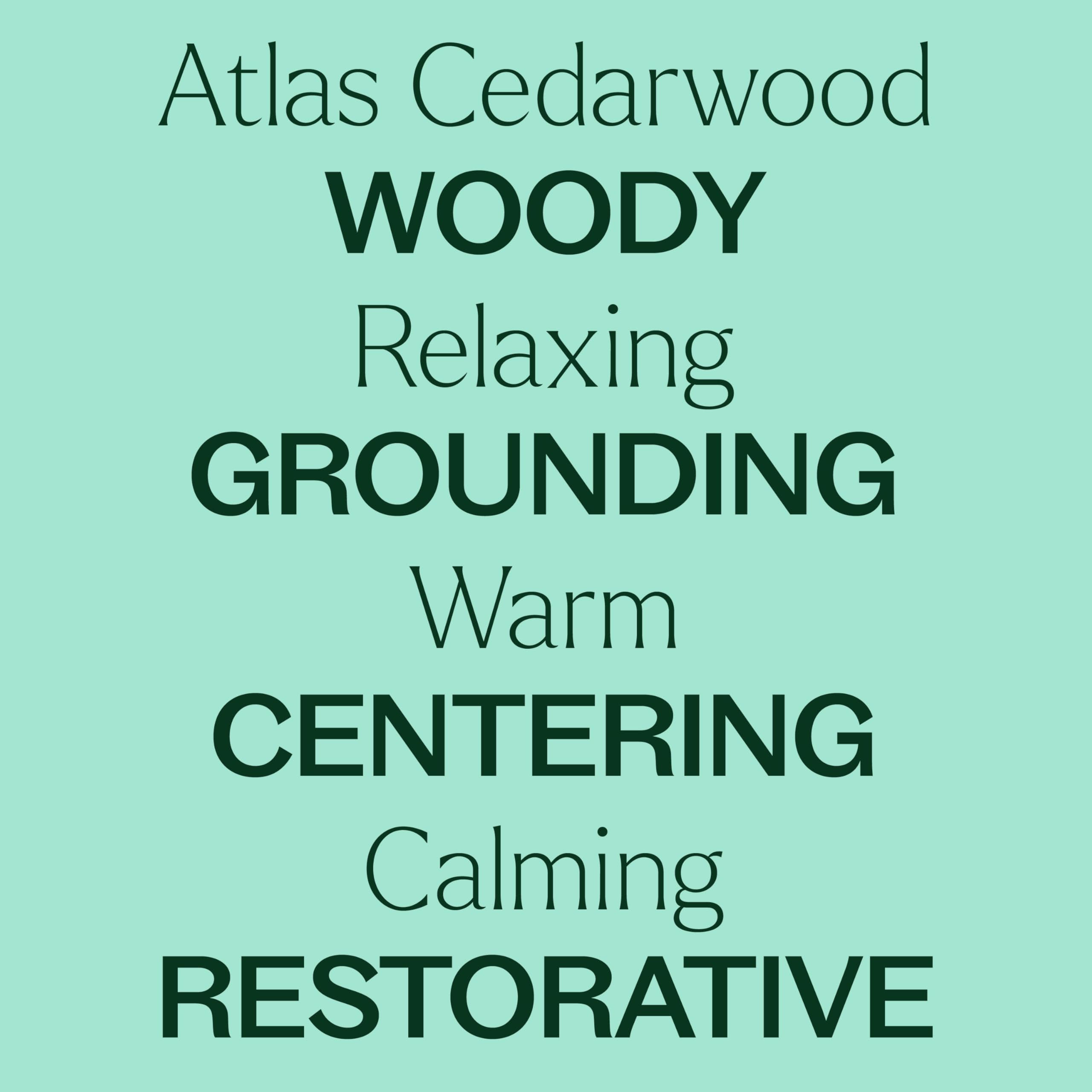 Cedarwood Atlas essential oil bottle on wooden surface
