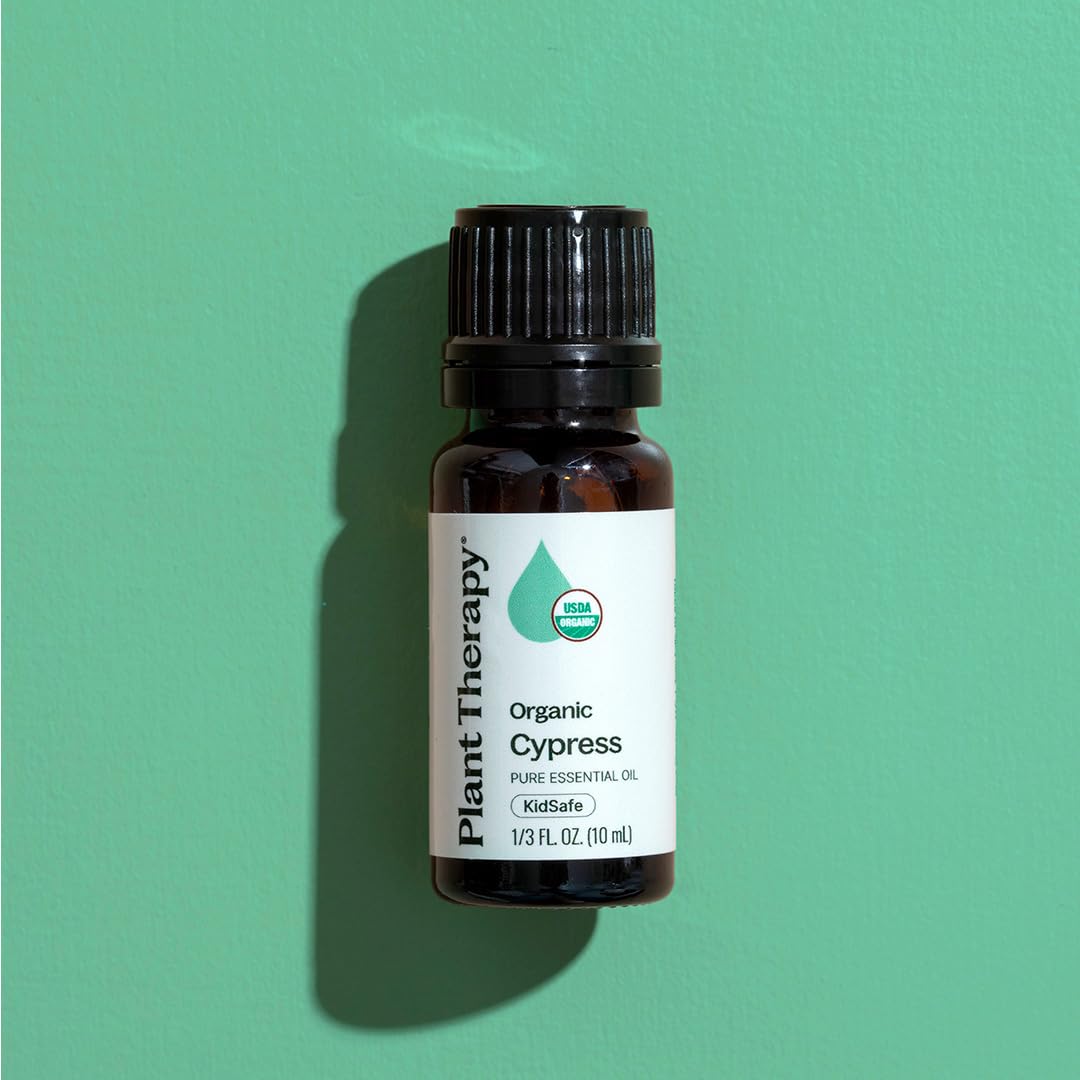 Cypress essential oil bottle with packaging