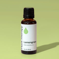 Uncapped bottle of lemongrass essential oil with dropper
