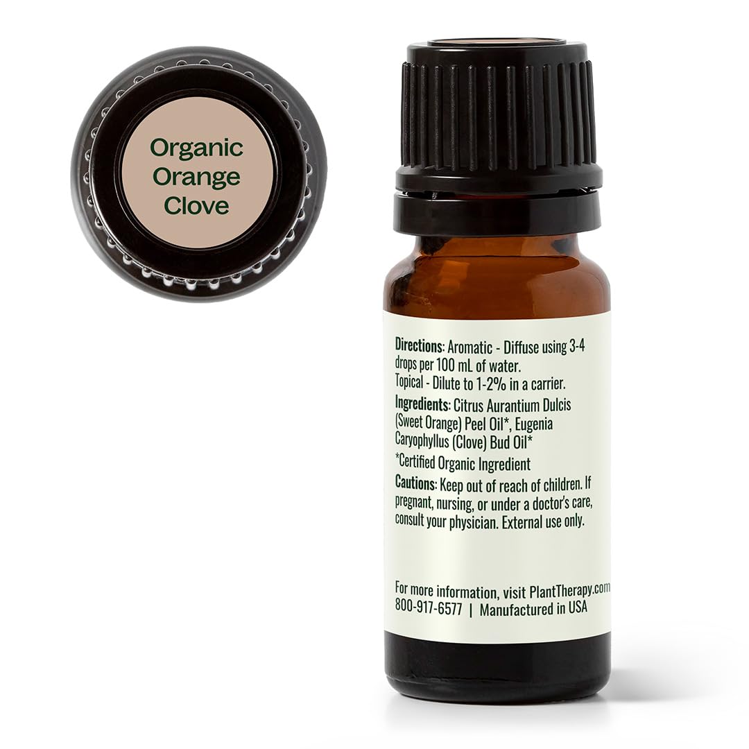 Packaging featuring the 10 mL bottle of Orange Clove essential oil blend