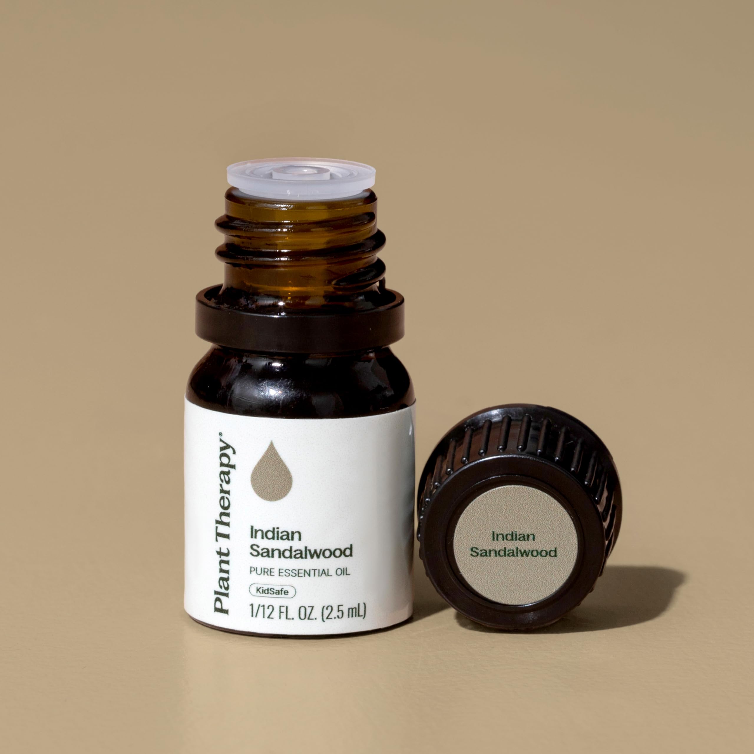 Plant Therapy Sandalwood Indian Oil in diffuser releasing a warm scent at dusk.