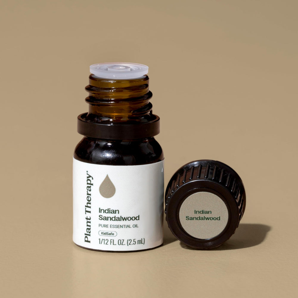 Plant Therapy Sandalwood Indian Oil in diffuser releasing a warm scent at dusk.