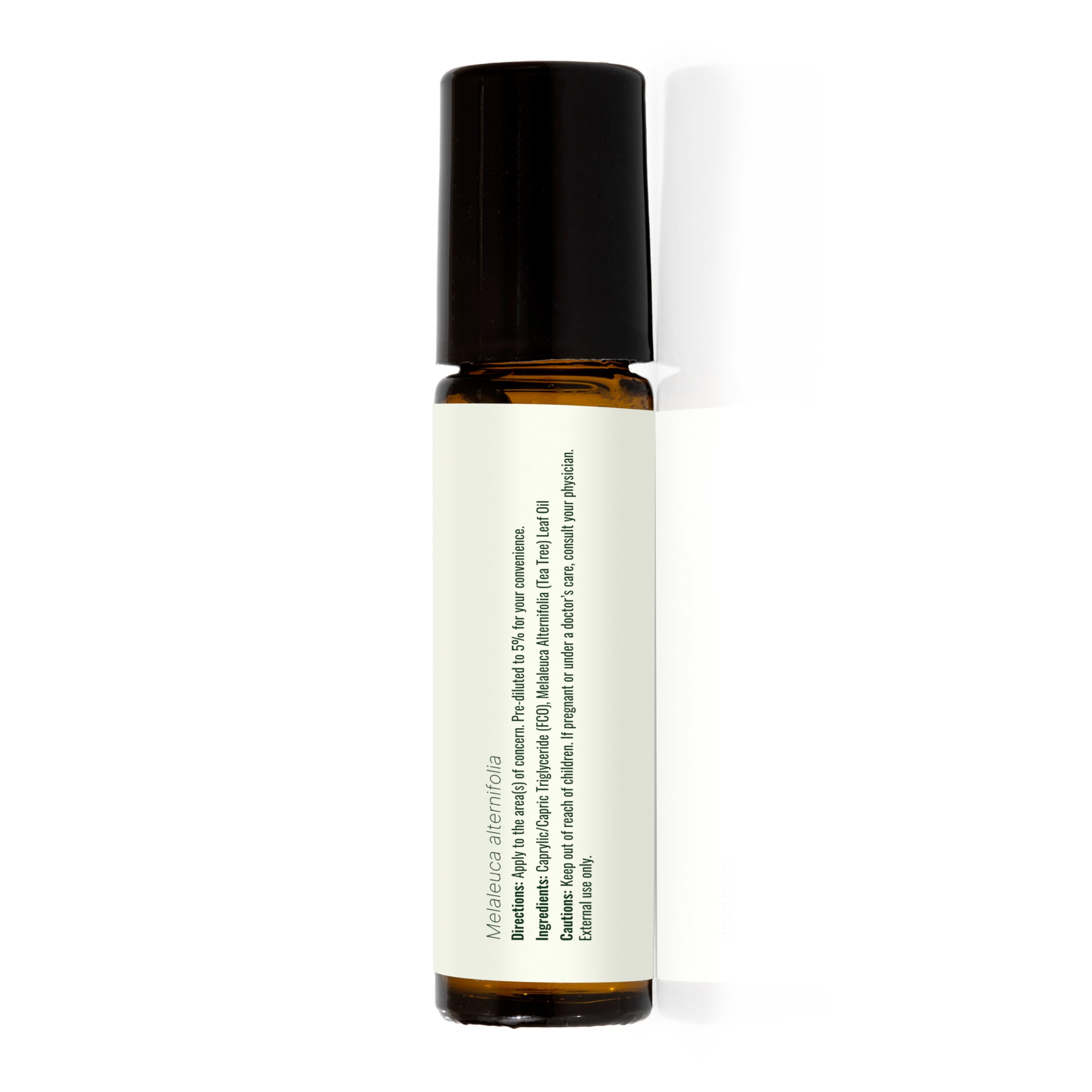 Lifestyle shot showing tea tree oil usage for skincare
