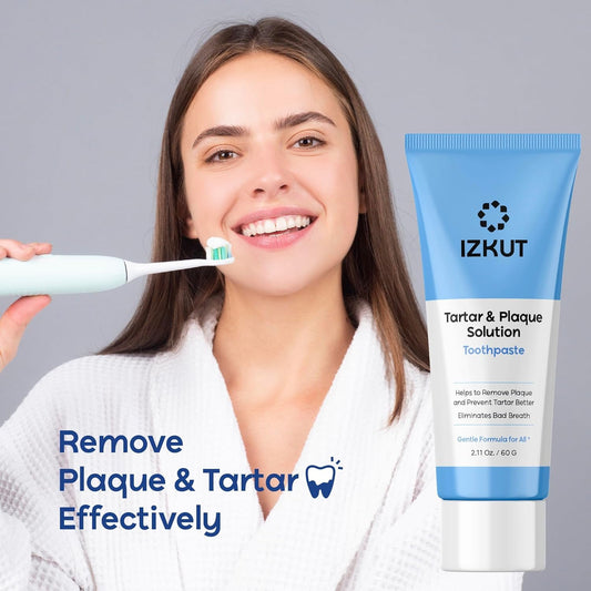 Toothpaste being squeezed onto a toothbrush