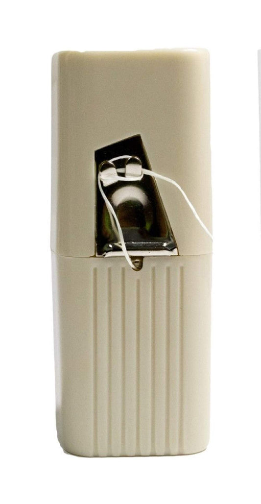 Plasdent 207FSD Professional Floss Dispenser in Beige holding 200-yard floss refills