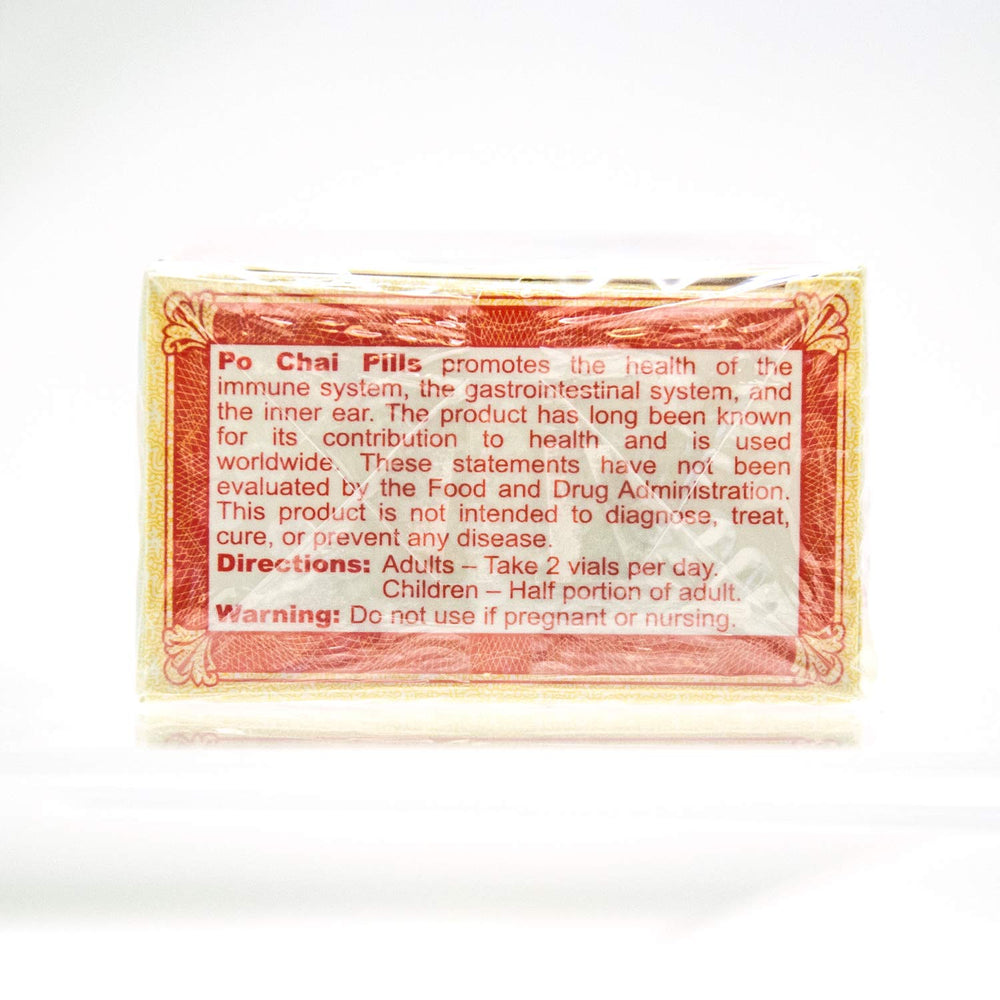 Close-up of Po Chai Pills vial and bottle