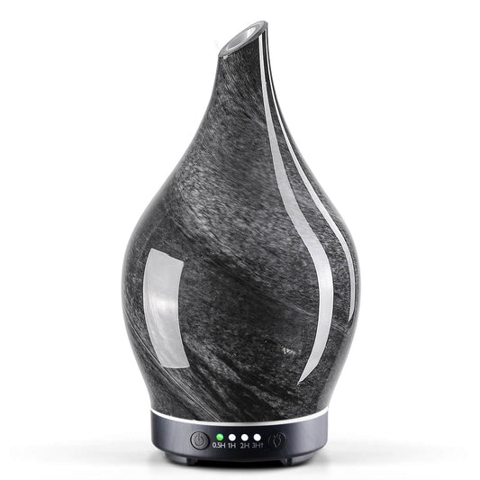 Porseme 150ml glass diffuser in Obsidian with star-shaped glass cover and wood grain base