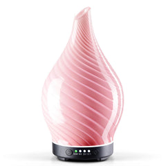 Porseme 150ml glass diffuser with pink star-shaped glass cover and wooden base, front view