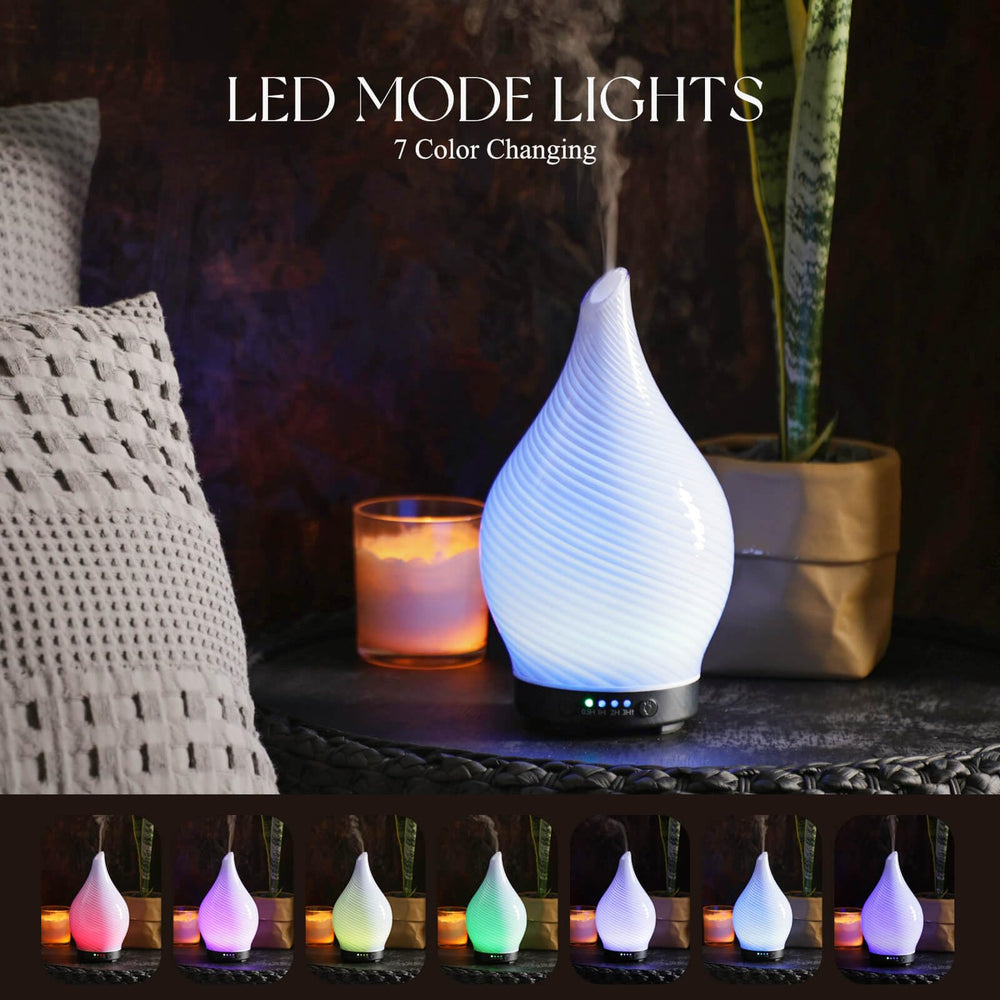 Diffuser emitting a gentle cool mist for aromatherapy