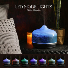 Star-shaped glass cover and wood grain base of Porseme diffuser
