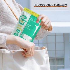 Eight portable flossers with reusable travel cases