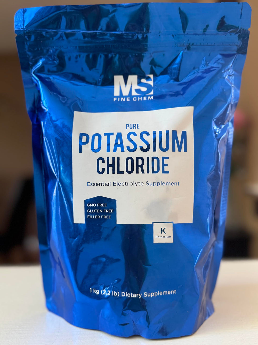 Potassium Chloride Powder packaging with scoop
