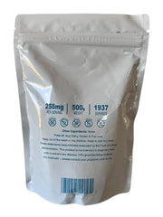 Potassium citrate powder in a jar with scoop