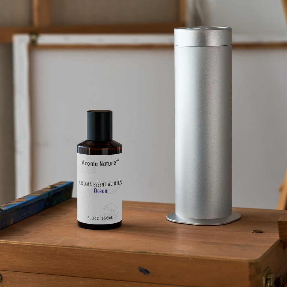 Diffuser oil being poured into a diffuser bottle (150 mL)