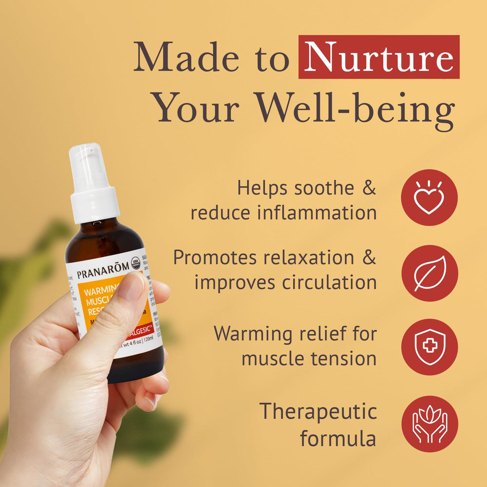 Applying Pranarom Warming Muscle Rescue Oil during massage