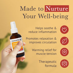 Applying Pranarom Warming Muscle Rescue Oil during massage