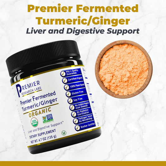 Close-up of turmeric and ginger powder scoop