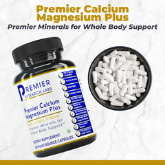 Capsules next to bottle showing supplement packaging