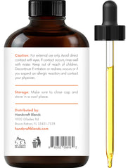 Premium grade orange essential oil bottled in USA