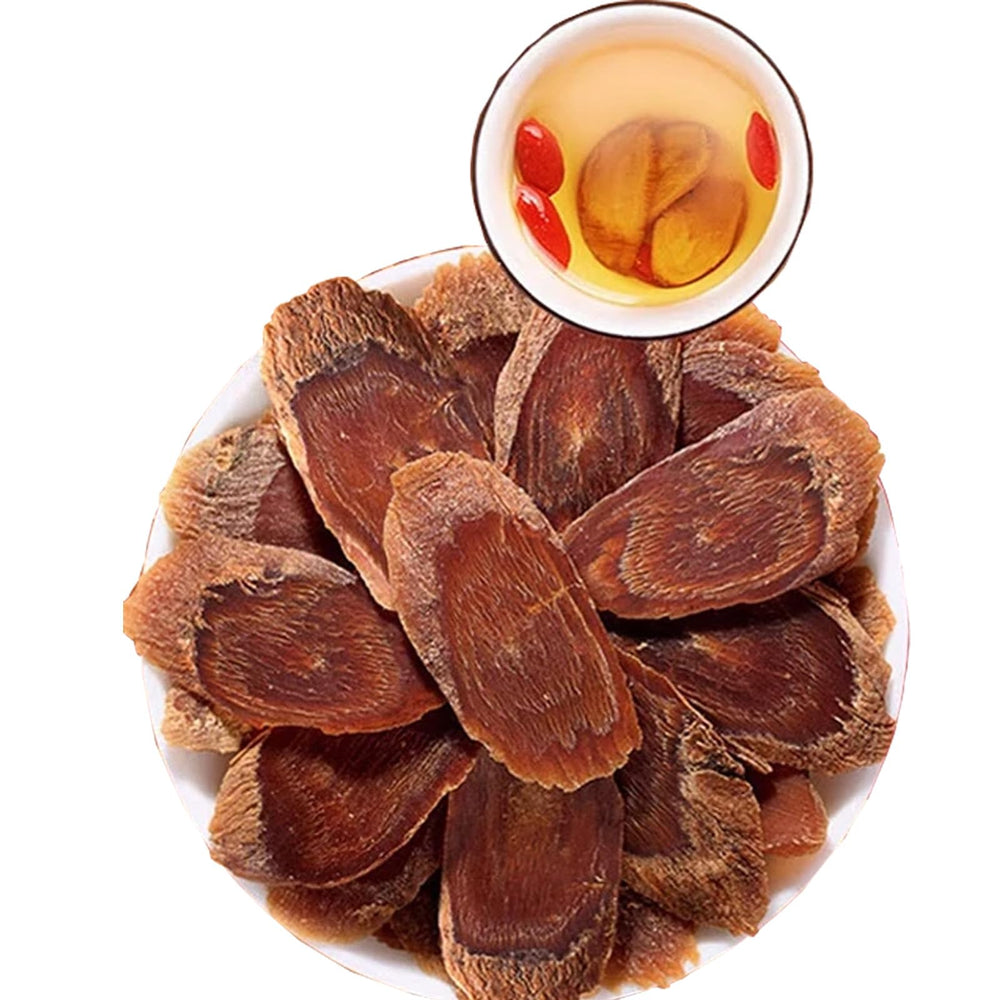 Stack of sliced Panax red ginseng showing deep maroon color