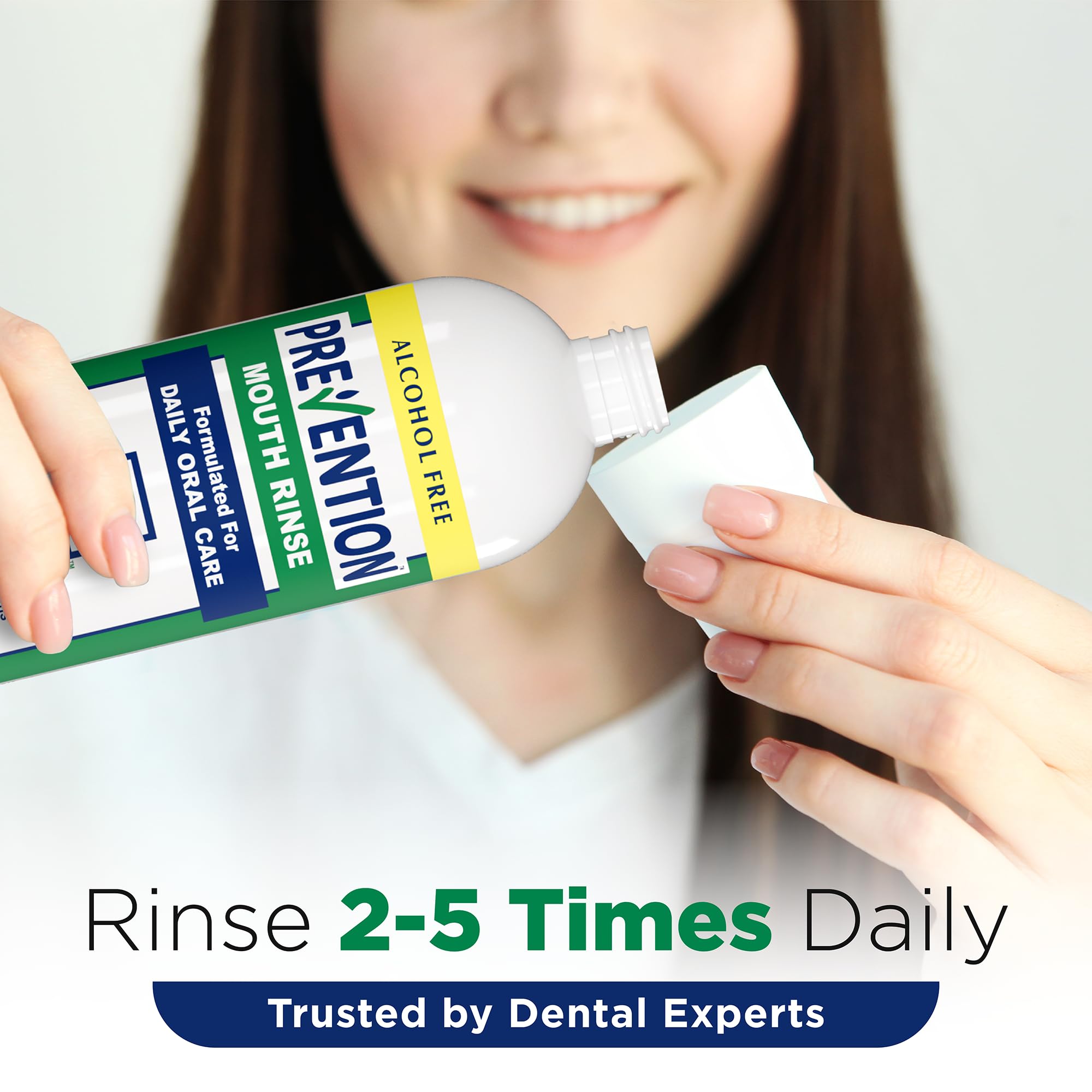 Mouthwash being poured into a cup for daily rinse