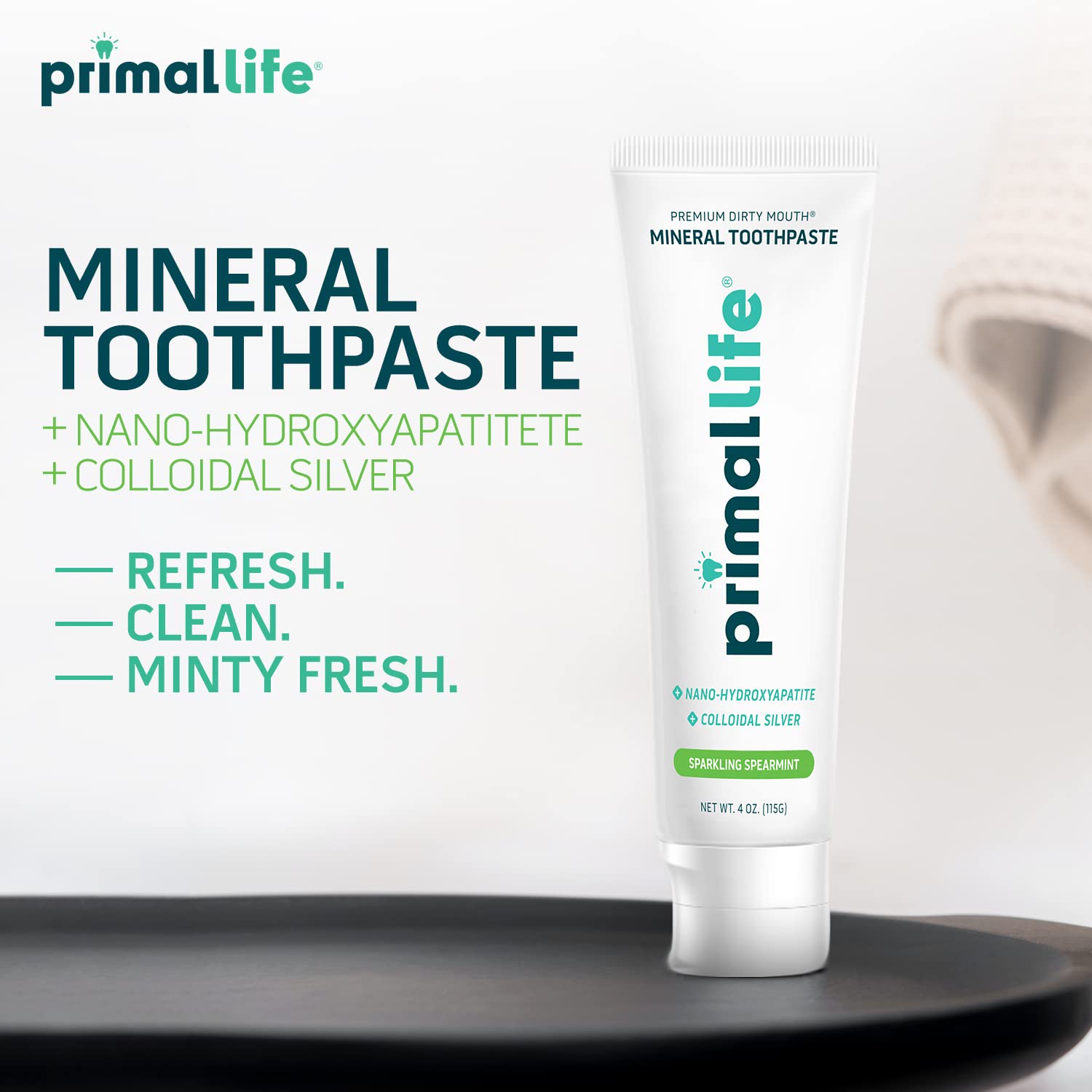Close-up of toothpaste tube highlighting nano-hydroxyapatite and charcoal