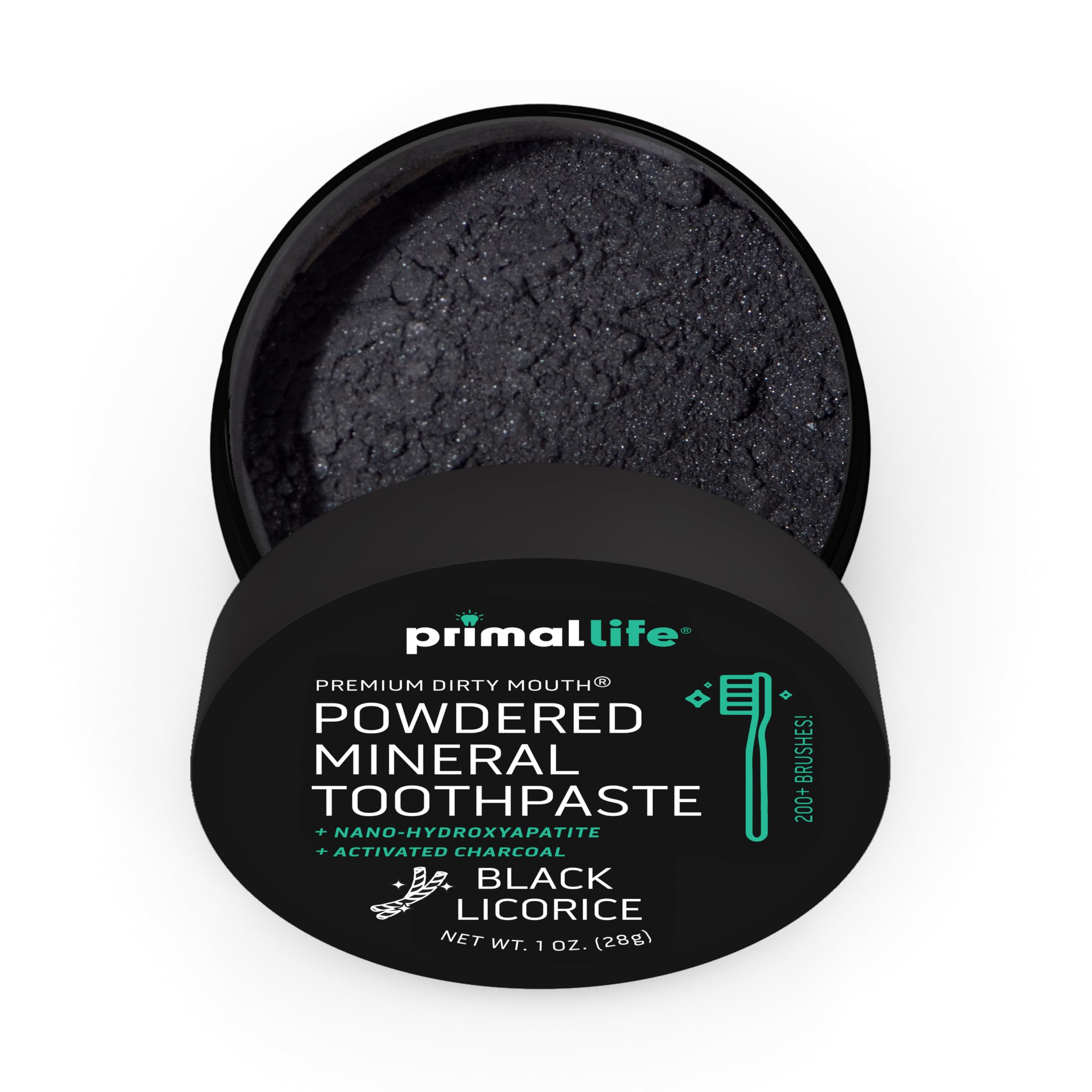 Close-up of toothbrush with Dirty Mouth Toothpowder powder