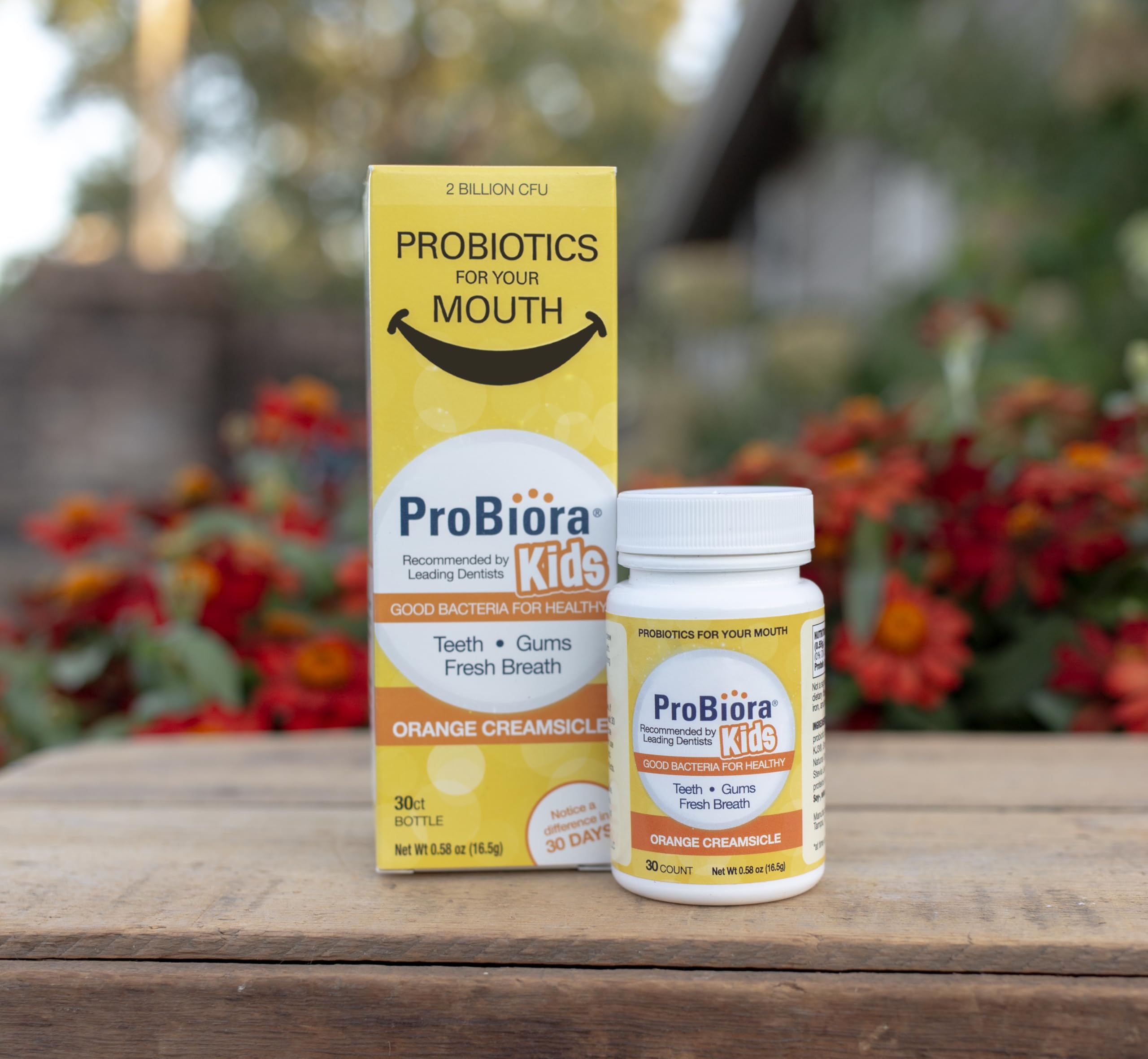 Happy child with healthier teeth and gums after using ProBiora Kids
